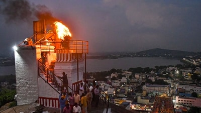 A lamp lit at Thiruparankundram temple as part of 'Karthigai Deepam' festival celebrations, in Madurai district, Tamil Nadu. (PTI) A lamp lit at Thiruparankundram temple as part of 'Karthigai Deepam' festival celebrations, in Madurai district, Tamil Nadu. (PTI)