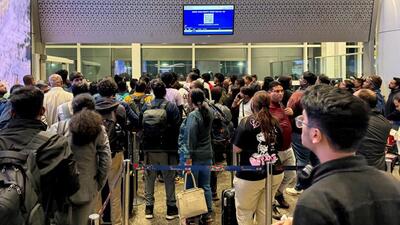 Passengers crowd outside a boarding gate as they wait to board a delayed IndiGo flight at Indira Gandhi International Airport in New Delhi. (Reuters) Passengers crowd outside a boarding gate as they wait to board a delayed IndiGo flight at Indira Gandhi International Airport in New Delhi. (Reuters)