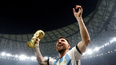Argentina's Lionel Messi celebrates winning the World Cup in Qatar. (REUTERS)