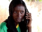 Martha Mathias, a teacher whose husband was kidnapped, speaks as parents are still searching for their children days after armed people abducted students and teachers of St. Mary's Private Catholic Secondary School, in Niger, Nigeria, November 24, 2025. 