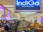 Stranded passengers stand in a queue at a counter after IndiGo cancelled more than 400 flights at the Chhatrapati Shivaji Maharaj International Airport (CSMIA) in Mumbai early on Friday. Stranded passengers stand in a queue at a counter after IndiGo cancelled more than 400 flights at the Chhatrapati Shivaji Maharaj International Airport (CSMIA) in Mumbai early on Friday.