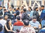 Passengers wait at the Raipur airport on Thursday. (PTI) Passengers wait at the Raipur airport on Thursday. (PTI)
