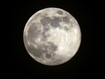 The last supermoon of 2025, the Cold Moon, rises above Los Angeles on December 4, 2025. (Photo by Frederic J. BROWN / AFP)