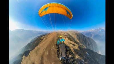 A participant during a paragliding fest organised by Jawahar Institute of Mountaineering and Winter Sports at Aru valley in Anantnag district. (PTI) A participant during a paragliding fest organised by Jawahar Institute of Mountaineering and Winter Sports at Aru valley in Anantnag district. (PTI)