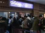 Passengers wait at the Sardar Vallabhbhai Patel International Airport as IndiGo’s flight disruptions continue, in Ahmedabad on Saturday. Passengers wait at the Sardar Vallabhbhai Patel International Airport as IndiGo’s flight disruptions continue, in Ahmedabad on Saturday.