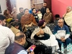 Amarinder Singh Raja Warring meet the family of Vasu Chopra in Ludhiana on Saturday. (Manish/Hindustan Times) Amarinder Singh Raja Warring meet the family of Vasu Chopra in Ludhiana on Saturday. (Manish/Hindustan Times)
