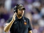 Matt Campbell of the Iowa State Cyclones calls a play during the second half against the TCU Horned Frogs 