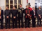 New Delhi: Chief of the Naval Staff Admiral Dinesh Kumar Tripathi, Congress MP Shashi Tharoor and other dignitaries during a state banquet at Rashtrapati Bhavan.