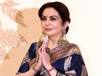 Nita Ambani wore a blue Banarasi saree designed by Manish Malhotra. She wore a custom polki blouse with it that further elevated the ethnic Indian look. Nita Ambani wore a blue Banarasi saree designed by Manish Malhotra. She wore a custom polki blouse with it that further elevated the ethnic Indian look.