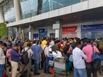Passengers wait in queues to enquire about flight status at Chennai Airport amid IndiGo flight disruptions on Friday. (PTI) Passengers wait in queues to enquire about flight status at Chennai Airport amid IndiGo flight disruptions on Friday. (PTI)