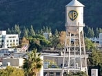 An aerial view of the Warner Bros. logo displayed on the water tower at Warner Bros. Studio on December 5, 2025 in Burbank, California. Mario Tama/Getty Images/AFP (Photo by MARIO TAMA / GETTY IMAGES NORTH AMERICA / Getty Images via AFP) An aerial view of the Warner Bros. logo displayed on the water tower at Warner Bros. Studio on December 5, 2025 in Burbank, California. Mario Tama/Getty Images/AFP (Photo by MARIO TAMA / GETTY IMAGES NORTH AMERICA / Getty Images via AFP)