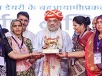Union home cooperation minister Amit Shah being felicitated after the inauguration of newly constructed bio-CNG and fertiliser plant of Banas Dairy, in Vav Tharad on Saturday. (Amit Shah / X) Union home cooperation minister Amit Shah being felicitated after the inauguration of newly constructed bio-CNG and fertiliser plant of Banas Dairy, in Vav Tharad on Saturday. (Amit Shah / X)