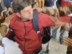 Screengrab of the video of the scuffle at Lucknow airport Screengrab of the video of the scuffle at Lucknow airport