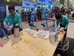 Bengaluru airport staff were seen helping passengers with water and snacks amid IndiGo cancellations.