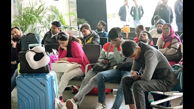 Stranded passengers wait at Jaiprakash Narayan Airport in Patna amid widespread IndiGo flights disruptions (SANTOSH KUMAR/HT) Stranded passengers wait at Jaiprakash Narayan Airport in Patna amid widespread IndiGo flights disruptions (SANTOSH KUMAR/HT)