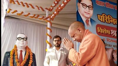 Uttar Pradesh chief minister Yogi Adityanath pays tribute to Dr BR Ambedkar on his death anniversary in Lucknow on Saturday. (PTI PHOTO) Uttar Pradesh chief minister Yogi Adityanath pays tribute to Dr BR Ambedkar on his death anniversary in Lucknow on Saturday. (PTI PHOTO)