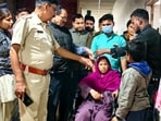 26-year-old Birbhum resident Sunali Khatun, on a wheelchair accompanied by her minor son and other officials.  