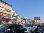 Wrongly parked vehicles block a thoroughfare in Patrakarpuram. (HT) Wrongly parked vehicles block a thoroughfare in Patrakarpuram. (HT)