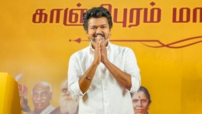 Kanchipuram: TVK leader Vijay greets the gathering during a public meeting, in Kanchipuram. (PTI Photo) (PTI )
