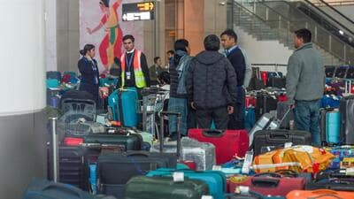 Stranded passengers inquiry about flight status at T1 Terminal of IGI Airport due to mass cancellation of IndiGo flights in New Delhi on Sunday. (RAJ K RAJ /HT PHOTO) Stranded passengers inquiry about flight status at T1 Terminal of IGI Airport due to mass cancellation of IndiGo flights in New Delhi on Sunday. (RAJ K RAJ /HT PHOTO)