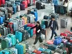 Baggage piles up at T1 at IGI Airport as more flights got cancelled. (Vipin Kumar/HT Photo)