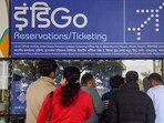 Passengers enquire at an IndiGo airlines counter amid flight disruptions, at Birsa Munda Airport, in Ranchi.