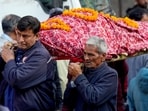 New Delhi: Relatives carry the body of a victim of a fire that devastated a nightclub in Goa on Sunday, at a crematorium in New Delhi, Monday, Dec. 8, 2025. The nightclub fire in North Goa killed 25 people and left several injured.