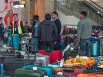 Stranded passengers inquiry about flight status at T1 Terminal of IGI Airport due to mass cancellation of IndiGo flights in New Delhi on Sunday. (RAJ K RAJ /HT PHOTO) Stranded passengers inquiry about flight status at T1 Terminal of IGI Airport due to mass cancellation of IndiGo flights in New Delhi on Sunday. (RAJ K RAJ /HT PHOTO)