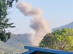 Smoke rises from the site, after Thailand launched air strikes along its disputed border with Cambodia, according to Thai army, in Choeteal Kong, Preah Vihear Province, Cambodia,