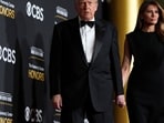 President Donald Trump and first lady Melania Trump look dashing in black as they walk the red carpet before the 48th Kennedy Center Honors, Sunday, Dec. 7, 2025, at the John F. Kennedy Center for the Performing Arts in Washington. (AP Photo/Julia Demaree Nikhinson)