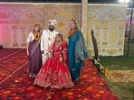 The Bacevicius sisters pose with Vikesh Kapoor and Ranjana Singh at the couple’s New Delhi wedding.