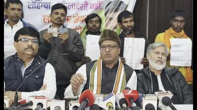 Assamese residents show documents at Congress headquarters in Lucknow on Monday. (Sourced)
