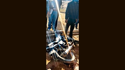 The damaged motorcycle after it was hit by a truck from behind, resulting in the death of both the riders in Zirakpur on Monday. (HT Photo)