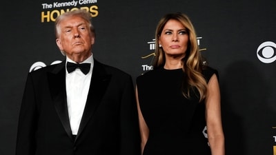 President Donald Trump and first lady Melania Trump face the cameras as they arrive at the 48th Kennedy Center Honors, Sunday, Dec. 7, 2025, at the John F. Kennedy Center for the Performing Arts in Washington. (AP Photo/Julia Demaree Nikhinson) (AP) President Donald Trump and first lady Melania Trump face the cameras as they arrive at the 48th Kennedy Center Honors, Sunday, Dec. 7, 2025, at the John F. Kennedy Center for the Performing Arts in Washington. (AP Photo/Julia Demaree Nikhinson) (AP)