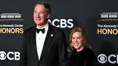 Virginia Governor Glenn Youngkin and his wife Suzanne Schulze arrive for the 48th Kennedy Center Honors gala at the Kennedy Center in Washington, DC, on December 7, 2025. (Photo by Alex WROBLEWSKI / AFP) (AFP) Virginia Governor Glenn Youngkin and his wife Suzanne Schulze arrive for the 48th Kennedy Center Honors gala at the Kennedy Center in Washington, DC, on December 7, 2025. (Photo by Alex WROBLEWSKI / AFP) (AFP)