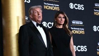 US President Donald Trump and First Lady Melania Trump arrive for the 48th Kennedy Center Honors gala at the Kennedy Center in Washington, DC, on December 7, 2025. (Photo by Brendan SMIALOWSKI / AFP) (AFP) US President Donald Trump and First Lady Melania Trump arrive for the 48th Kennedy Center Honors gala at the Kennedy Center in Washington, DC, on December 7, 2025. (Photo by Brendan SMIALOWSKI / AFP) (AFP)