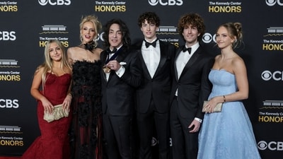 Emily Stanley, Erin Sutton Stanley, Kennedy Center Honors recipient member of the band KISS, Paul Stanley, Colin Stanley, Evan Stanley, and Sarah Stanley pose on the red carpet for the 2025 Kennedy Center Honors at the John F. Kennedy Center for the Performing Arts in Washington, D.C., U.S., December 7, 2025. REUTERS/Jeenah Moon (REUTERS)