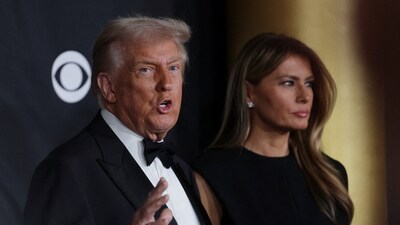 U.S. President Donald Trump and first lady Melania Trump pose on the red carpet for the 2025 Kennedy Center Honors at the John F. Kennedy Center for the Performing Arts in Washington, D.C., U.S., December 7, 2025. REUTERS/Jeenah Moon (REUTERS)