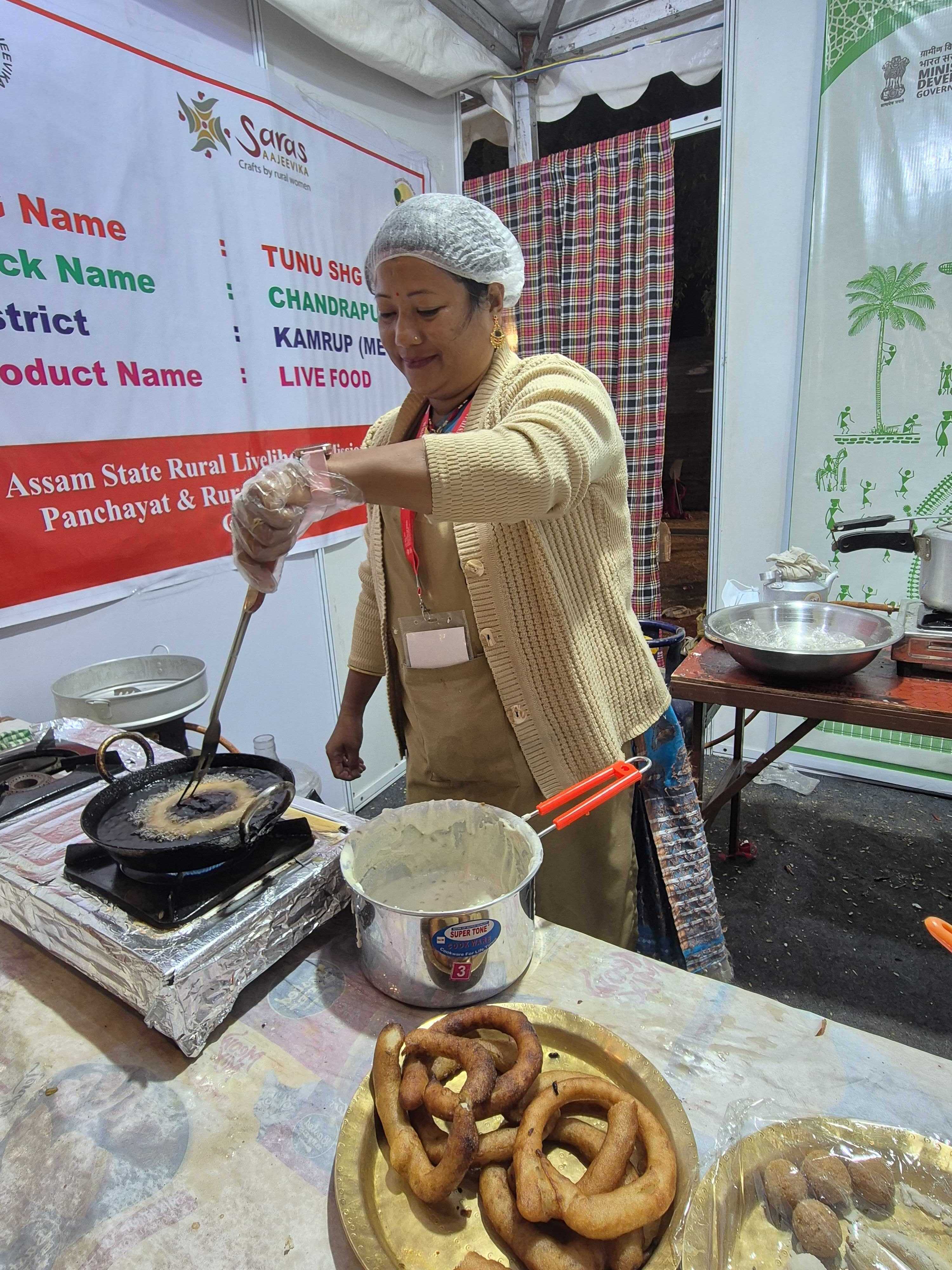 One of the Lakhpati didis preparing Sel Roti. One of the Lakhpati didis preparing Sel Roti.