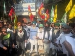 Employees of the state power utility also joined the SKM stir as protesters burnt the copies of the proposed Bills. (HT File)