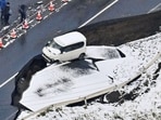 Photo taken from a Kyodo News airplane on December 9, 2025, shows a collapsed road in Tohoku in Aomori Prefecture, northeastern Japan, following a strong earthquake that struck the region the previous night in this photo taken by Kyodo.