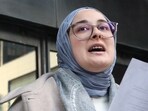 Tufts University doctoral student Rumeysa Ozturk reads from a prepared statement following a court hearing outside the John Joseph Moakley United States Courthouse Thursday, Dec. 4, 2025, in Boston. Tufts University doctoral student Rumeysa Ozturk reads from a prepared statement following a court hearing outside the John Joseph Moakley United States Courthouse Thursday, Dec. 4, 2025, in Boston.