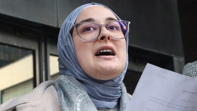 Tufts University doctoral student Rumeysa Ozturk reads from a prepared statement following a court hearing outside the John Joseph Moakley United States Courthouse Thursday, Dec. 4, 2025, in Boston. (AP) Tufts University doctoral student Rumeysa Ozturk reads from a prepared statement following a court hearing outside the John Joseph Moakley United States Courthouse Thursday, Dec. 4, 2025, in Boston. (AP)