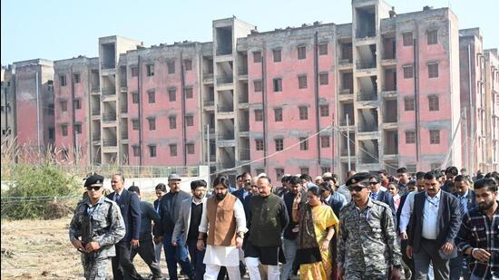 Delhi Chief Minister Rekha Gupta inspects EWS flats in Bhalswa on Tuesday. (Arvind Yadav/HT Photo)