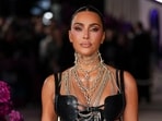 Kim Kardashian poses for photographers upon arrival at the premiere of the television series "All's Fair" on Wednesday, Oct. 22, 2025, in London. (Photo by Scott A Garfitt/Invision/AP)