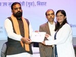 Bihar Deputy CM and home minister Samrat Choudhary distributes appointment letters to newly appointed Assistant Sub Inspector at Sardar Patel Bhawan in Patna on Wednesday. (Santosh Kumar/HT)