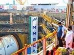 Mumbai, India. Dec 03, 2025 - The first Tunnel Boring Machine (TBM) for the Orange Gate to Marine Drive tunnel road project was launched in the presence of Chief Minister Devendra Fadnavis and Deputy Chief Minister Eknath Shinde at the front area, Princes Dock in Mumbai, India. Dec 03, 2025. (Photo by Raju Shinde/HT Photo) (Raju Shinde)