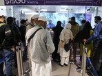 New Delhi, Dec 08 (ANI): Stranded passengers stand at the IndiGo airline ticket counter after IndiGo cancels flights at Indira Gandhi International Airport, in New Delhi (ANI Photo/Naveen Sharma) New Delhi, Dec 08 (ANI): Stranded passengers stand at the IndiGo airline ticket counter after IndiGo cancels flights at Indira Gandhi International Airport, in New Delhi (ANI Photo/Naveen Sharma)