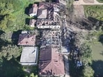 In this aerial photo provided by Wai Hun Aung, damaged buildings are seen at the hospital that was allegedly hit by a military air strike in Mrauk-U township in Rakhine state, Myanmar.