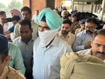 Now suspended, Ropar Range DIG HS Bhullar Bhullar, 58, and Krishanu, 29, a national-level hockey player, were arrested on October 16 following a complaint filed by Akash Batta, a scrap dealer from Mandi Gobindgarh. (HT)